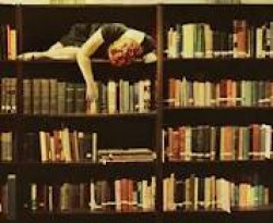 woman reading on bookcase